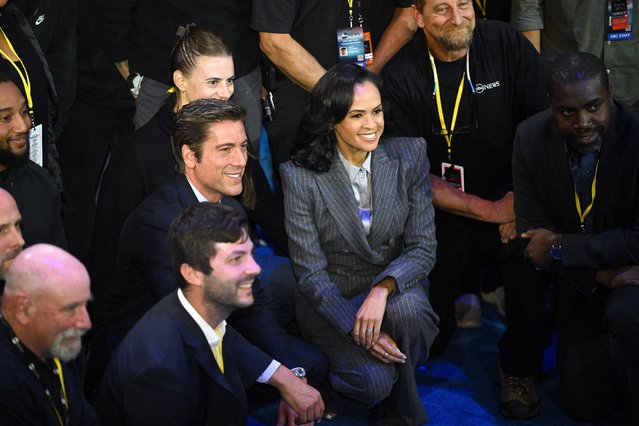 US broadcaster David Muir (L) and US broadcaster Linsey Davis (R) pose for pictures with ABC News crew members at the end of a presidential debate with US Vice President and Democratic presidential candidate Kamala Harris and former US President and Republican presidential candidate Donald Trump at the National Constitution Center in Philadelphia, Pennsylvania, on September 10, 2024. (Photo by Saul Loeb/AFP Photo)