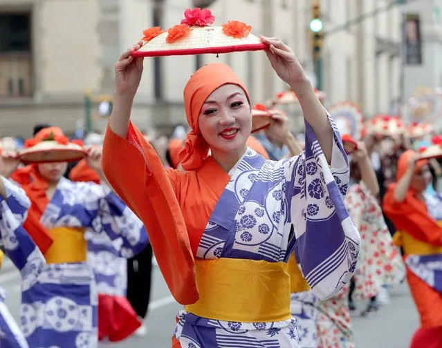 Marchers dressed in traditional Japanese costumes and clothing performed traditional dance and music while participating in the inaugural Japan Parade along Central Park West in New York City on May 14, 2022. (Photo by Andrew Schwartz/SIPA/Rex Features/Shutterstock)