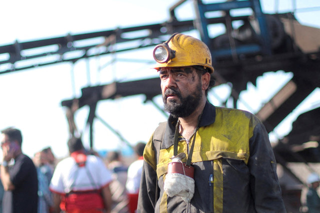 Miners gather after a gas explosion in a coal mine in South Khorasan Province, Iran on September 22, 2024. (Photo by Mohsen Noferesti/IRNA/WANA via Reuters)