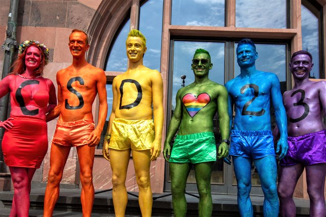 Participants in the Christopher Street Day (CSD) LGBTQ+ street parade pose for a photo in Frankfurt am Main, western Germany, on July 15, 2023. (Photo by Andre Pain/AFP Photo)