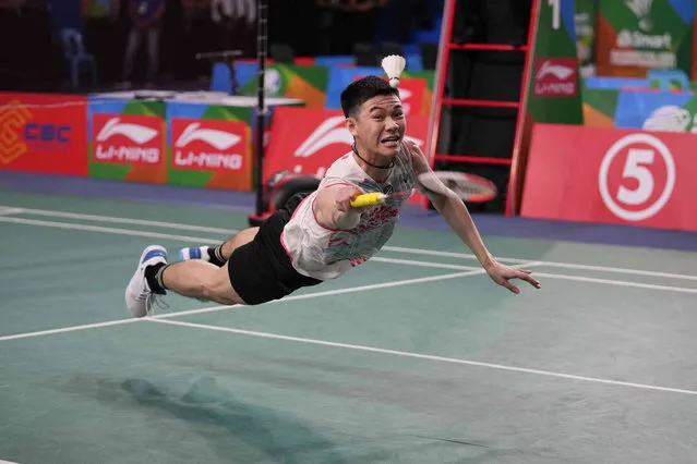 Malaysia's Lee Zii Jia return a shot from Indonesia's Jonatan Christie during men's single finals of Badminton Asia Championships 2022 in Muntinlupa, Philippines on Sunday, May 1, 2022. (Photo by Aaron Favila/AP Photo)
