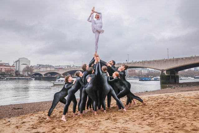 Performers from the Australian circus troupe, Circa, practise on the banks of the Thames in preparation for their Swan Lake remake at London’s South Bank Centre on December 17, 2024. (Photo by Times Photographer Jack Hill)
