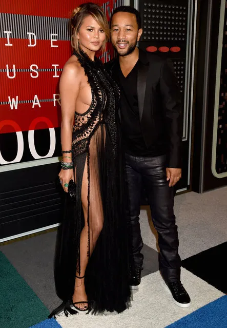 Model Chrissy Teigen (L) and recording artist John Legend attend the 2015 MTV Video Music Awards at Microsoft Theater on August 30, 2015 in Los Angeles, California. (Photo by Jeff Kravitz/FilmMagic)