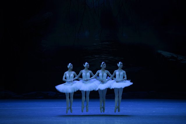 Ballet dancers perform in “Swan Lake”, composed by Russian composer Pyotr Tchaikovsky, at Donbass Opera in Donetsk, Russian-controlled Ukraine, on December 22, 2024. (Photo by AFP Photo/Stringer)