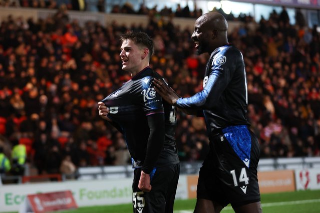 Justin Devenny of Crystal Palace celebrates with teammate Jean-Philippe Mateta after scoring their side's second goal during the Emirates FA Cup Fourth Round match between Doncaster Rovers and Crystal Palace at Eco-Power Stadium on February 10, 2025 in Doncaster, England. (Photo by Alex Livesey – Danehouse/Getty Images)