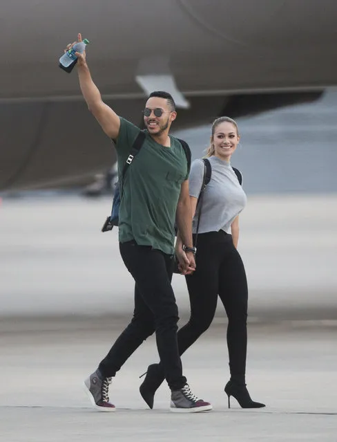 Houston Astros' Carlos Correa arrives with his fiance Daniella Rodriguez to Houston, Thursday, November 2, 2017, a day after winning the World Series. (Photo by Marie D. De Jesus/Houston Chronicle via AP Photo)