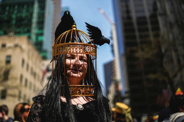 A person wearing a birdcage takes part in the annual Easter Parade and Bonnet Festival on 5th Avenue outside St. Patrick's Cathedral in Manhattan in New York City, U.S., April 20, 2025. (Photo by Eduardo Muñoz/Reuters)