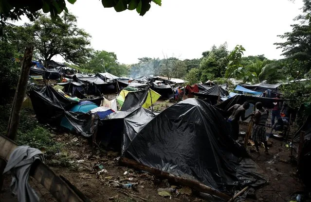 African migrants stranded in Costa Rica stand at camp at the border between Costa Rica and Nicaragua, in Penas Blancas, Costa Rica, September 7, 2016. (Photo by Juan Carlos Ulate/Reuters)