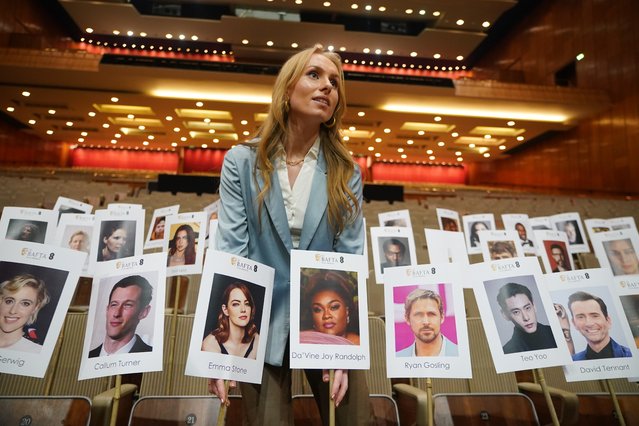 A staff member uses “heads on sticks” to check camera blocking at the Royal Festival Hall in London on Monday, February 12, 2024, ahead of the EE BAFTA Film Awards on Sunday.(Photo by Yui Mok/PA Images via Getty Images)