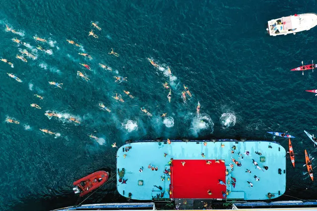 A drone photo shows swimmers during 32nd Bosphorus Cross-Continental Swimming Race organized by the Turkish Olympic Committee's (TOC) in Istanbul, Turkey on August 23, 2020. (Photo by Muhammed Enes Yildirim/Anadolu Agency via Getty Images)