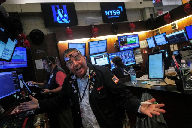 A trader reacts on the floor at the New York Stock Exchange (NYSE) in New York City on June 27, 2025. (Photo by Jeenah Moon/Reuters)