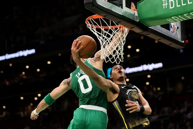 Jordan Poole #3 of the Golden State Warriors takes a shot against Jayson Tatum #0 of the Boston Celtics during the second half at TD Garden on January 19, 2023 in Boston, Massachusetts. The Celtics defeat the Warriors 121-118. (Photo by Maddie Meyer/Getty Images)