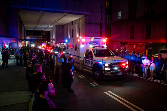 An ambulance carrying the body of Didarul Islam exits NewYork-Presbyterian/Weill Cornell hospital on July 28, 2025 during the transfer of the NYPD officer, who was killed by a gunman. (Photo by Angelina Katsanis/AP Photo)