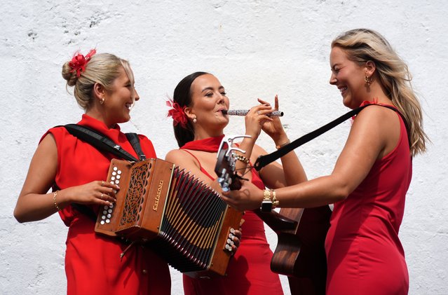 Eibhlin, Katie, and Laura of Cailini Lua perform at Galway Racecourse in Galway, Ireland on Thursday, July 31, 2025. (Photo by Brian Lawless/PA Images via Getty Images)