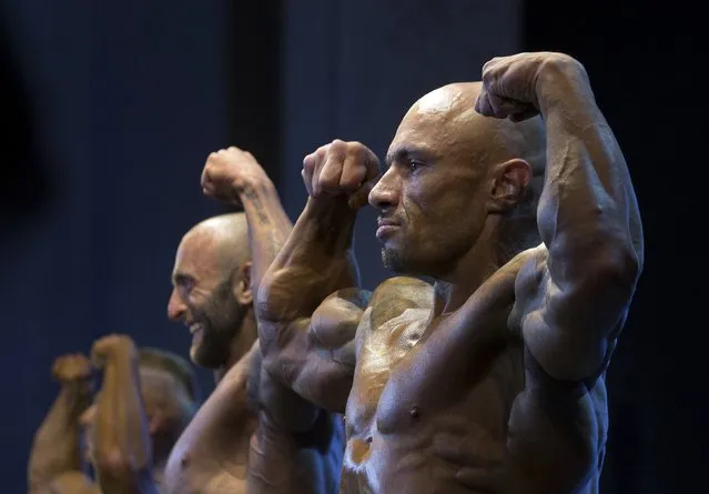 Men take part in Belarus Cup in bodybuilding and fitness in Minsk, October 24, 2015. (Photo by Vasily Fedosenko/Reuters)