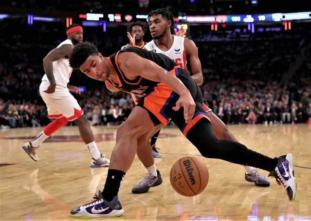 Quentin Grimes #6 of the New York Knicks tries to keep control of the ball as Cam Thomas #24 of the Brooklyn Nets defends in the second half at Madison Square Garden on March 01, 2023 in New York City. The New York Knicks defeated the Brooklyn Nets 149-118. (Photo by Elsa/Getty Images)