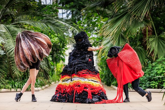 Performers wearing costumes made from kelp, rubber and second-hand textiles took part in rehearsals for the Material World design festival at Kew Gardens in southwest London on September 10, 2025. The event, which begins on September 20, will demonstrate how plants and fungi can tackle fast fashion. (Photo by Oliver Dixon)