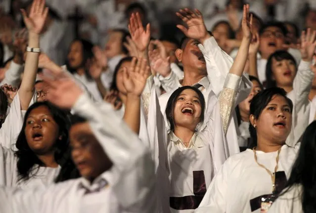 Christians attend a Christmas mass prayer at Gelora Bung Karno stadium in Jakarta, Indonesia, December 5, 2015. (Photo by Garry Lotulung/Reuters)