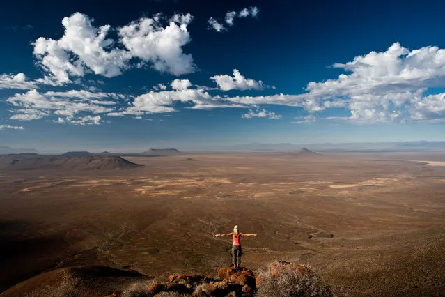 “God's Window”. This is a self portrait I shot whilst on a photographic assignment for WILD magazine in the Tankwa Karoo, Western Cape. I was humbled by the sense of space I felt looking down into the valley – the magnitude of nature and miracle of creation reminded me of how small we really are. (Photo and caption by Karin Schermbrucker/National Geographic Traveler Photo Contest)