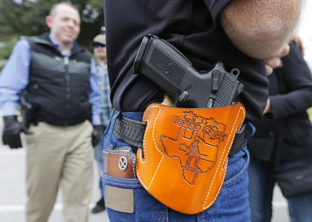 On January 1, 2016, the open carry law took effect in Texas, and 2nd Amendment activists held an open carry rally at the Texas state capitol on January 1, 2016 in Austin, Texas. (Photo by Erich Schlegel/Getty Images)