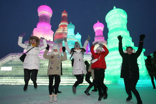 Tourists play at the opening ceremony of China 32nd Harbin Ice & Snow Sculpture Festival on January 5, 2016 in Harbin, Heilongjiang Province of China. (Photo by ChinaFotoPress/ChinaFotoPress via Getty Images)