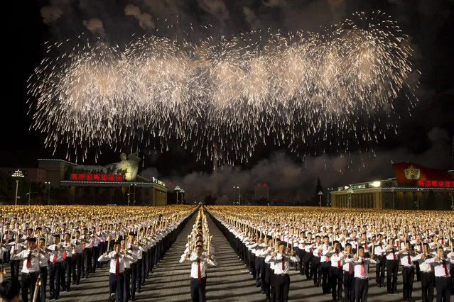 North Korean students take part in a torch light march held in conjunction with the 70th anniversary of North Korea's founding day celebrations in Pyongyang, North Korea, Monday, September 10, 2018. (Photo by Ng Han Guan/AP Photo)