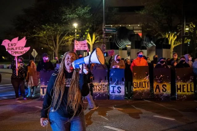 People attend a demonstration outside the Columbus Division of Police after an officer shot and killed a teenage girl in Columbus, Ohio, U.S., April 20, 2021. (Photo by Gaelen Morse/Reuters)