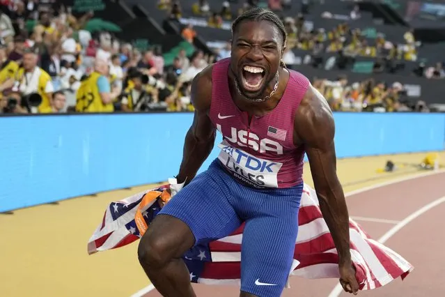 Noah Lyles, of the United States, celebrates after winning the gold medal in the Men's 100-meter final during the World Athletics Championships in Budapest, Hungary, Sunday, August 20, 2023. (Photo by Matthias Schrader/AP Photo)