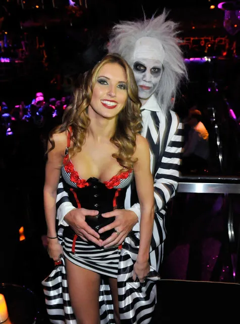 Audrina Patridge (L) and Corey Bohan attend a Halloween party at The Bank Nightclub at the Bellagio on October 30, 2010 in Las Vegas, Nevada. (Photo by David Becker/WireImage)