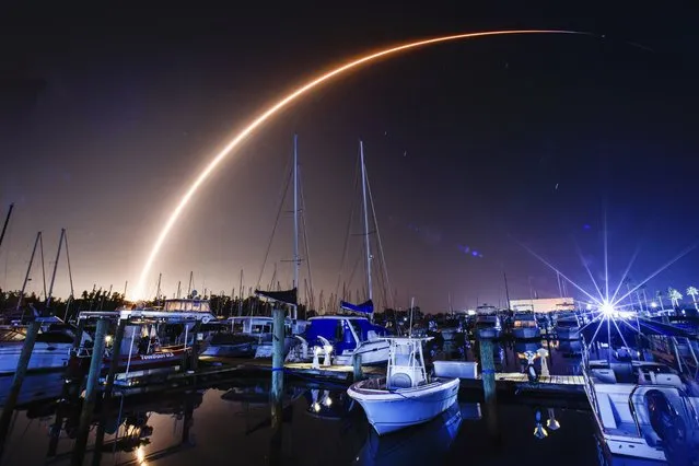 A SpaceX Falcon 9 rocket on the Starlink 6-27 mission launches from Launch Complex 40 at Cape Canaveral Space Force Station early Wednesday, November 8, 2023, as seen from Merritt Island, Fla. (Photo by Malcolm Denemark/Florida Today via AP Photo)