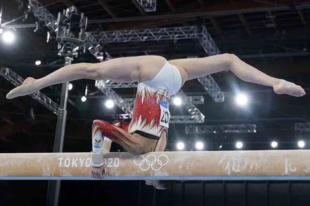 Nina Derwael, of Belgium, performs on the balance beam during the artistic gymnastics women's all-around final at the 2020 Summer Olympics, Thursday, July 29, 2021, in Tokyo. (Photo by Gregory Bull/AP Photo)