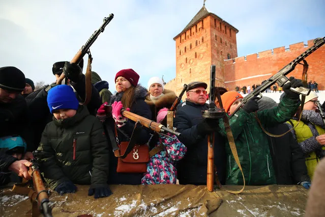Citizens gather at the Novgorod Kremlin to celebrate the 75th anniversary of the liberation of the city of Veliky Novgorod from the Nazi occupation on the Eastern Front of the Second World War in Veliky Novgorod, Russia on January 20, 2019. (Photo by Peter Kovalev/TASS)