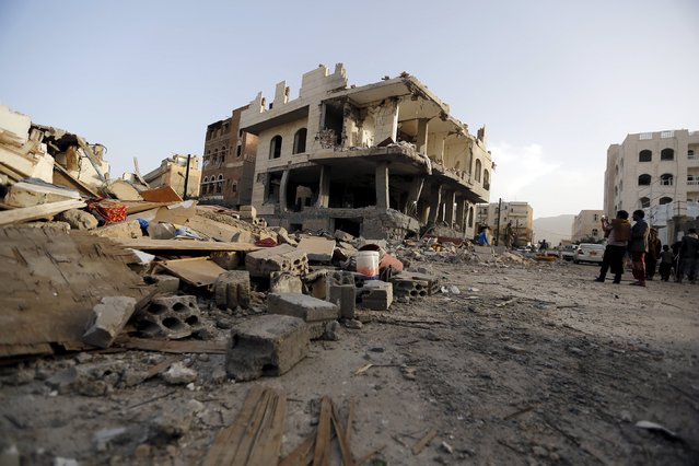 Rubble of houses destroyed by an air raid is seen in Sanaa April 26, 2015. (Photo by Khaled Abdullah/Reuters)