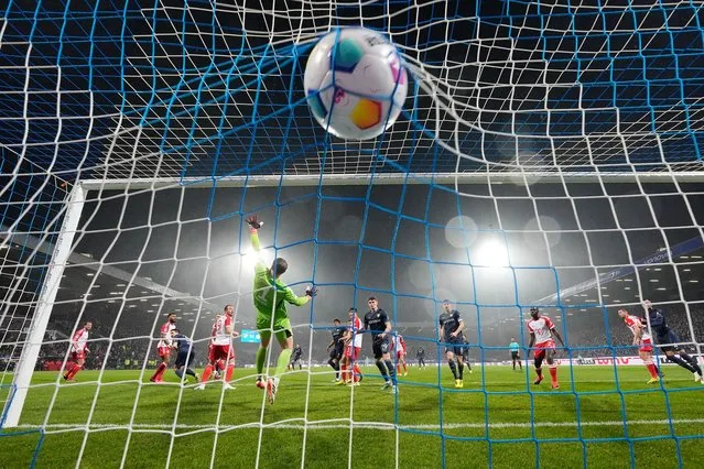 Bayern's goalkeeper Manuel Neuer receives the second goal by Bochum's Keven Schlotterbeck during the German Bundesliga soccer match between VfL Bochum and FC Bayern Munich in Bochum, Germany, Sunday, February 18, 2024. Bayern was defeated by Bochum with 3-2. (Photo by Martin Meissner/AP Photo)