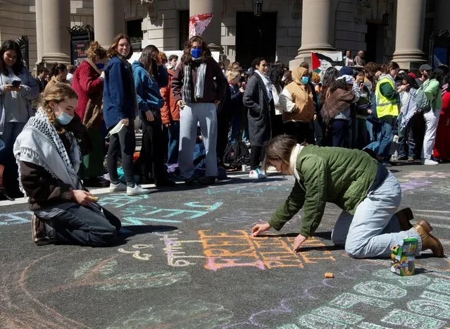 Protesters gather at the corner of Grove and College Streets after an encampment at Beinecke Plaza was broken up. Pro-Palestinian demonstrators call for Yale to disinvest from military weapons manufacturers, in New Haven, Connecticut, April 22, 2024. (Photo by Melanie Stengel/Reuters)
