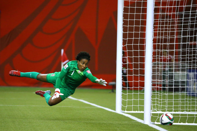 Brazil goalkeeper Luciana (1) dives for a shot by Spain as it goes wide of the goal in Montreal, June 13, 2015. (Photo by Jean-Yves Ahern/USA TODAY Sports)