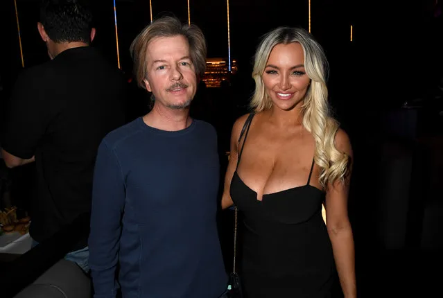 David Spade and Lindsey Pelas attend Comedy Central's “Lights Out With David Spade”, new late-night series premiere party, at Nightingale Plaza on August 01, 2019 in Los Angeles, California. (Photo by Jeff Kravitz/FilmMagic for Comedy Central)