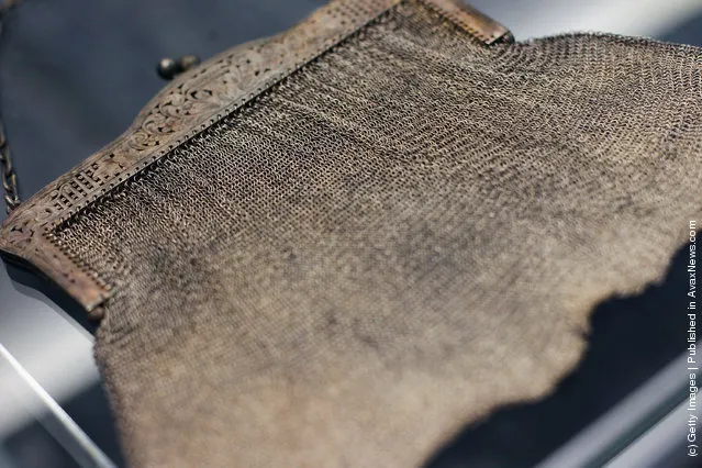 A gold mesh purse is seen among artifacts recovered from the RMS Titanic