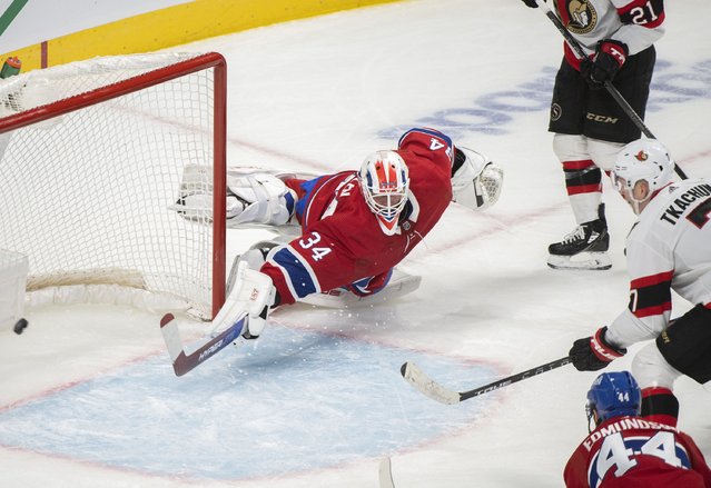 Montreal Canadiens goaltender Jake Allen is scored on by Ottawa Senators' Brady Tkachuk during the second period of an NHL hockey game in Montreal, Tuesday, April 5, 2022. (Photo by Graham Hughes/The Canadian Press via AP Photo)