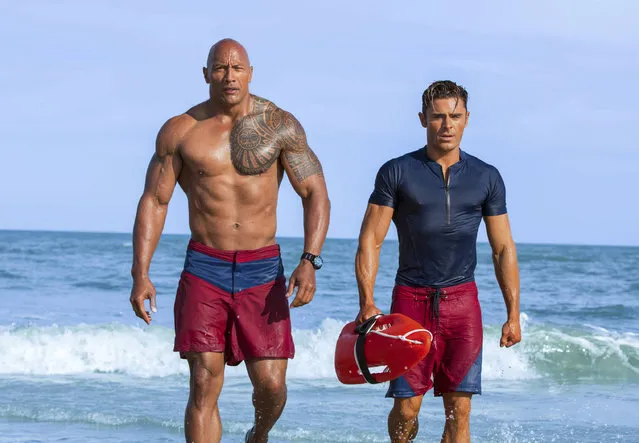 This image released by Paramount Pictures shows Dwayne Johnson as Mitch Buchannon, left, and Zac Efron as Matt Brody in “Baywatch”. (Photo by Frank Masi/Paramount Pictures via AP Photo)