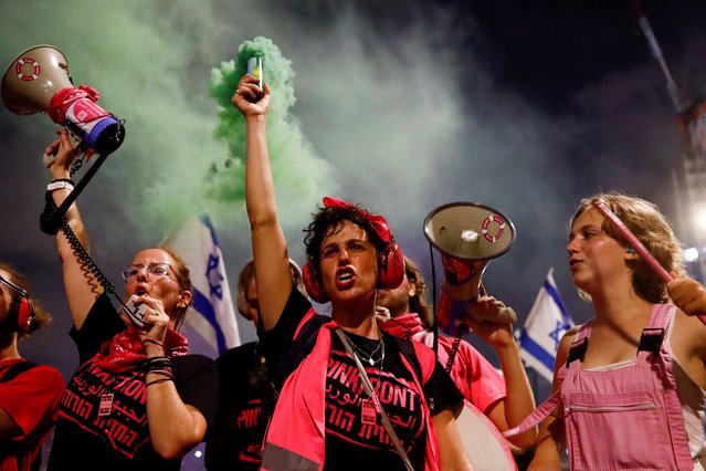 People take part in a demonstration against Israeli Prime Minister Benjamin Netanyahu and his nationalist coalition government's judicial overhaul, in Tel Aviv, Israel on July 8, 2023. (Photo by Corinna Kern/Reuters)