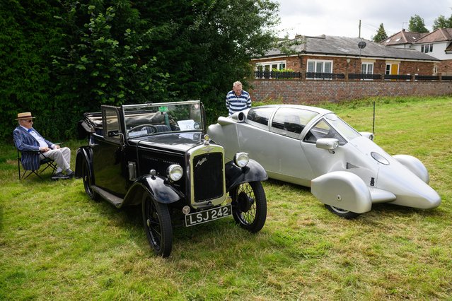 A 1934 Austin Seven (L) and custom-built unique “MBS” are seen during the annual classic car and motorcycle show on July 16, 2023 in Dudswell, near Berkhamsted, England. The annual fundraising event is organised by the Hospice of St Francis, which provides end of life support and care in Hertfordshire and Buckinghamshire. (Photo by Leon Neal/Getty Images)