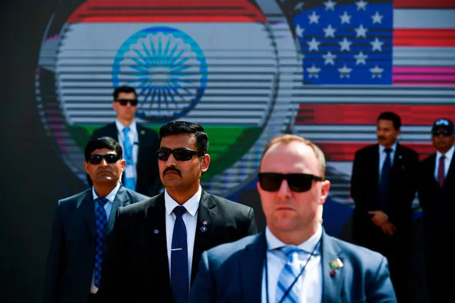 Members of the US Secret Service and Indian Special Protection Group (SPG) stand guard during 'Namaste Trump' rally at Sardar Patel Stadium in Motera, on the outskirts of Ahmedabad, on February 24, 2020. (Photo by Mandel Ngan/AFP Photo)