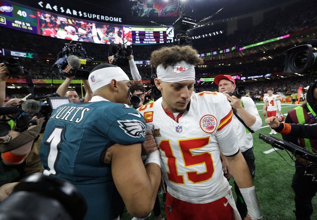 Philadelphia Eagles' Jalen Hurts shakes hands with Kansas City Chiefs' Patrick Mahomes after the game of the NFL Super Bowl 59 football game between the Kansas City Chiefs and the Philadelphia Eagles, Sunday, February 9, 2025, in New Orleans. (Photo by Mike Segar/Reuters)