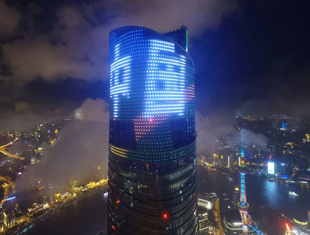 The words “Rio Olympics, go Shanghai, go China” are displayed on Shanghai Tower during the Rio de Janeiro Olympic Games, in Shanghai, China, August 9, 2016. (Photo by Reuters/Stringer)