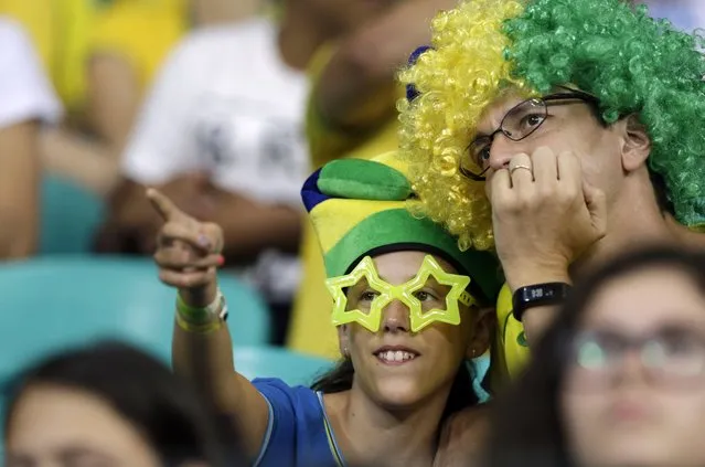 Brazil's supporters wait for the beginning of a group E match of the men' s Olympic football tournament between Brazil and Denmark in Salvador, Brazil, Wednesday August 10, 2016. (Photo by Leo Correa/AP Photo)