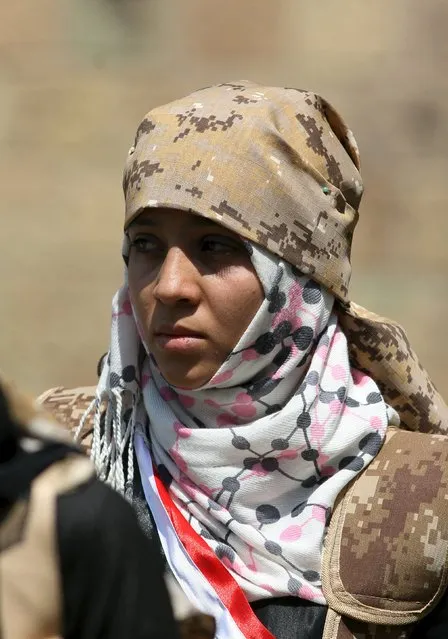 A fighter of the Popular Resistance Committees stands during a graduation ceremony of the affiliate special forces of the Popular Resistance, in Yemen's southwestern city of Taiz October 8, 2015. (Photo by Reuters/Stringer)