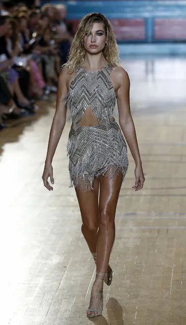 A model wears a creation by designer Julien Macdonald during his Spring/Summer 2017 runway show at London Fashion Week in London, Saturday, September 17, 2016. (Photo by Alastair Grant/AP Photo)