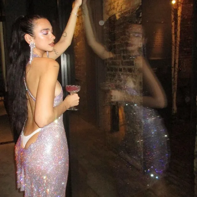 English-Albanian singer and songwriter Dua Lipa on December 31, 2022. The “One Kiss” singer went full Y2K to usher in 2023, wearing a crystal mesh Ludovic de Saint Sernin dress with a back so low, Lipa’s white thong played peekaboo. (Photo by dualipa/Instagram)