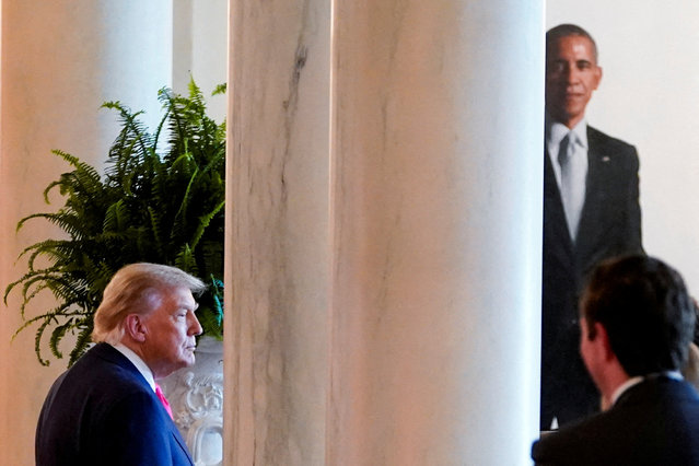 U.S. President Donald Trump looks on, as the portrait of former President Barack Obama can be seen in the background, on the day of a “One Big Beautiful” at the White House in Washington on June 26, 2025. (Photo by Nathan Howard/Reuters)